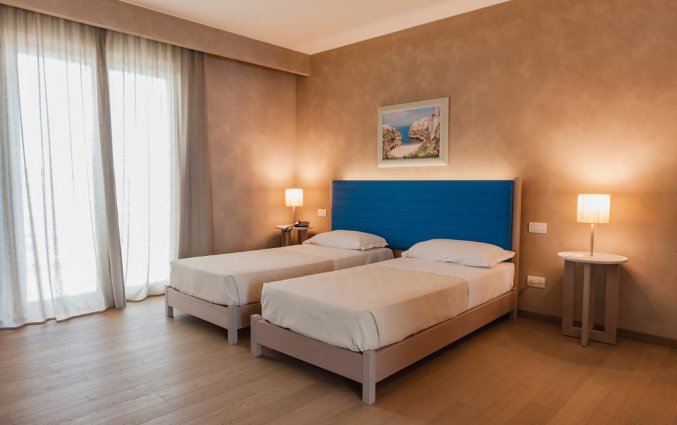 Tweepersoonskamer van Resort Spa Cala Ponte in Puglia