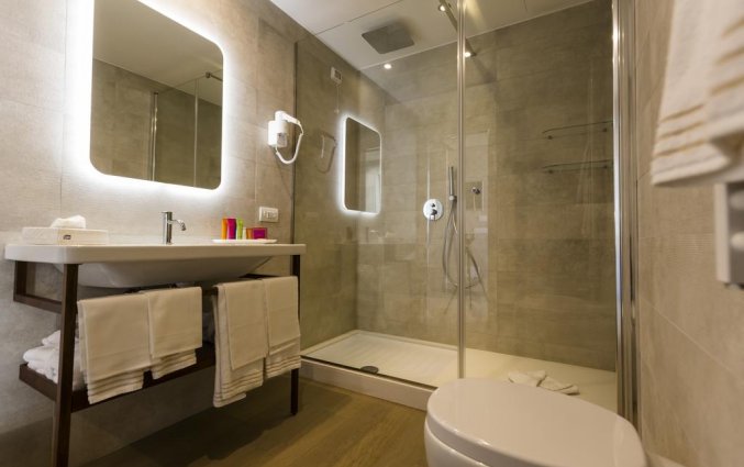 Badkamer van een tweepersoonskamer van Resort Spa Cala Ponte in Puglia