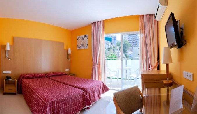 Slaapkamer van hotel La Cala in Alicante