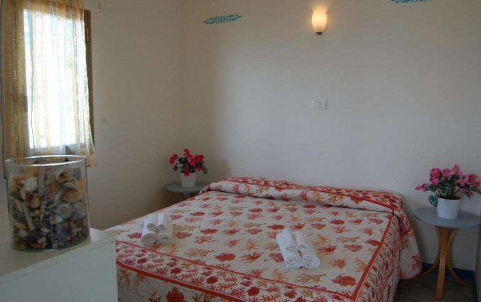 Kamer op Vakantiepark Villaggio Residence Nettuno