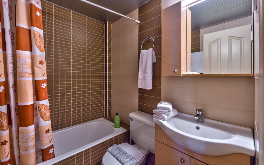 Een badkamer van een appartement van Apparthotel Theos Village Kreta