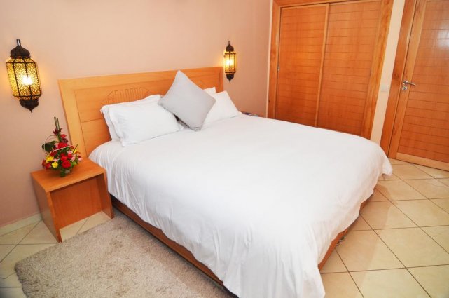 Een tweepersoonsbed van Aparthotel Atlantic Palm Beach Agadir