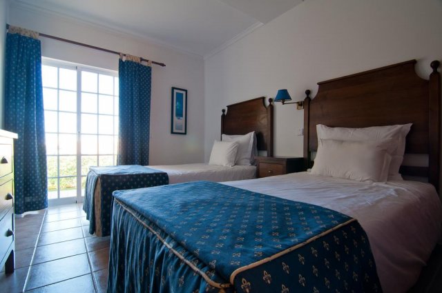 Kamer met bed van Appartementen Villas Barrocal Algarve
